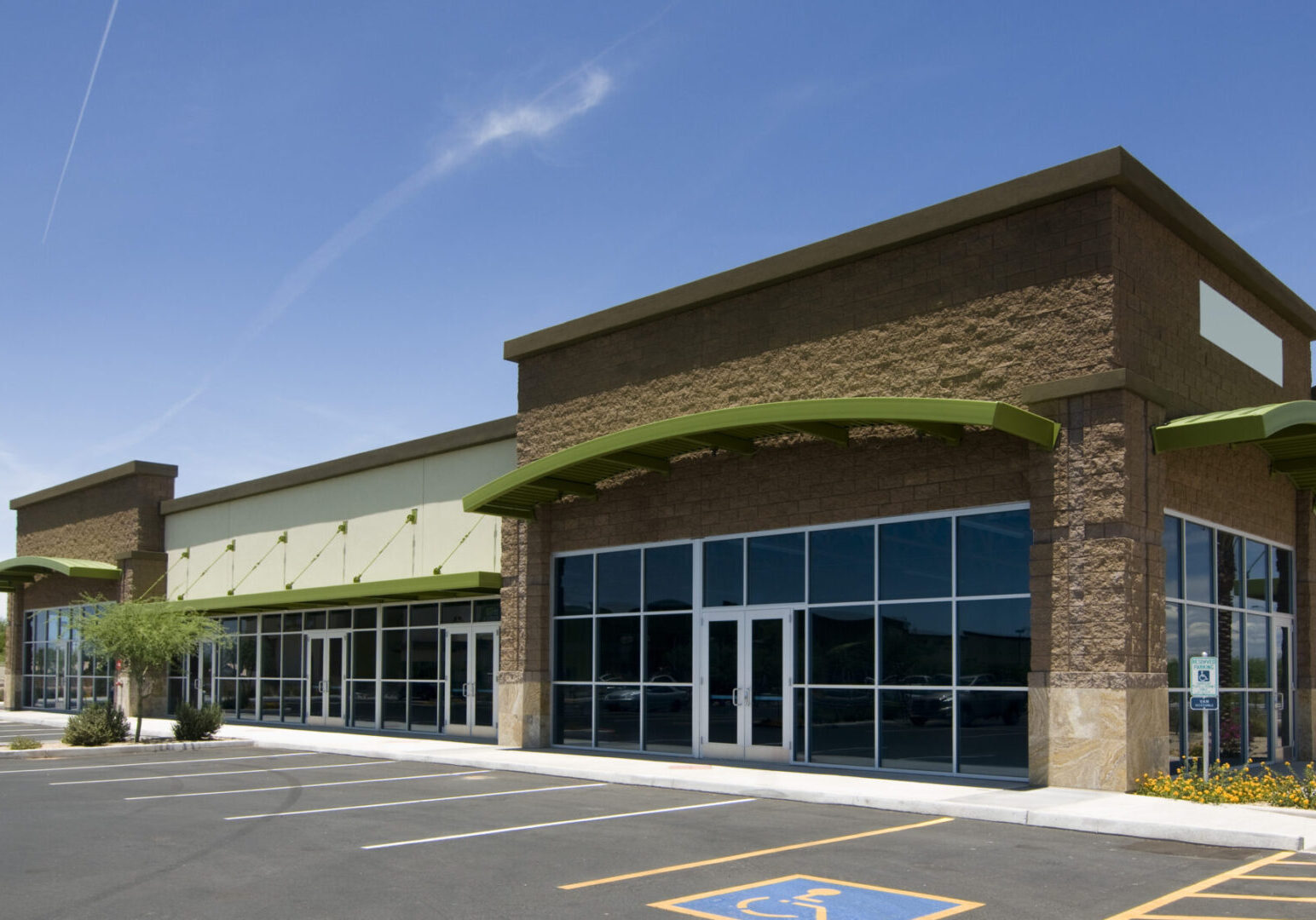 Exterior of new modern retail business architecture located on American strip Mall.
