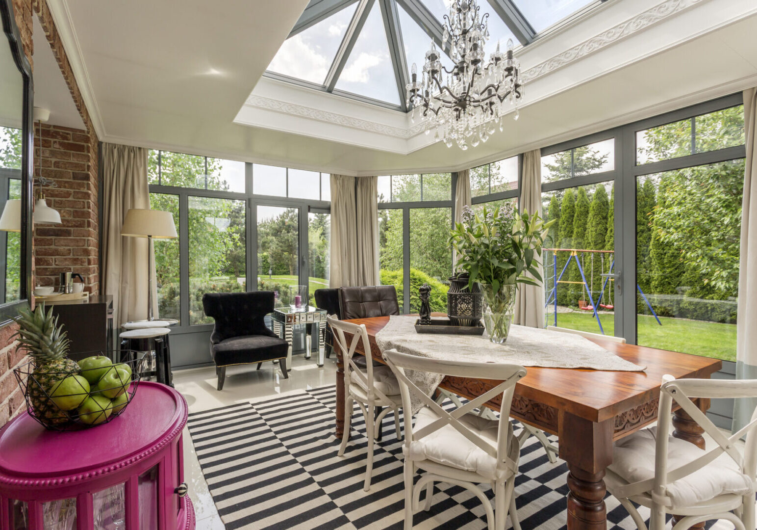 Glass elegant chandelier in creative conservatory or sunroom